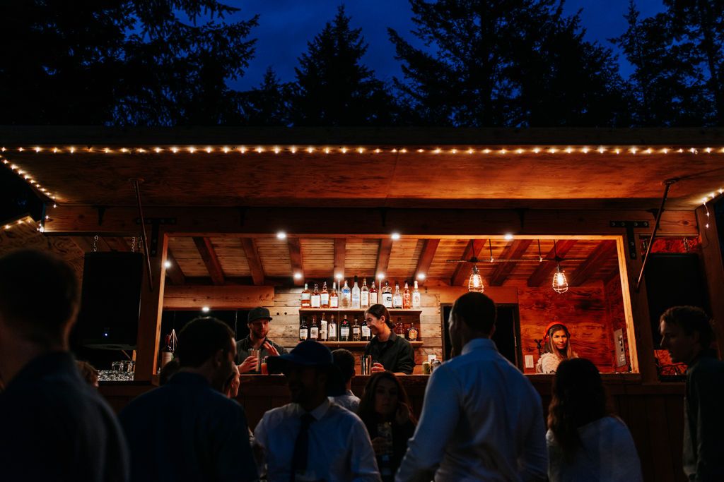 Guests at the Boombox bar at night