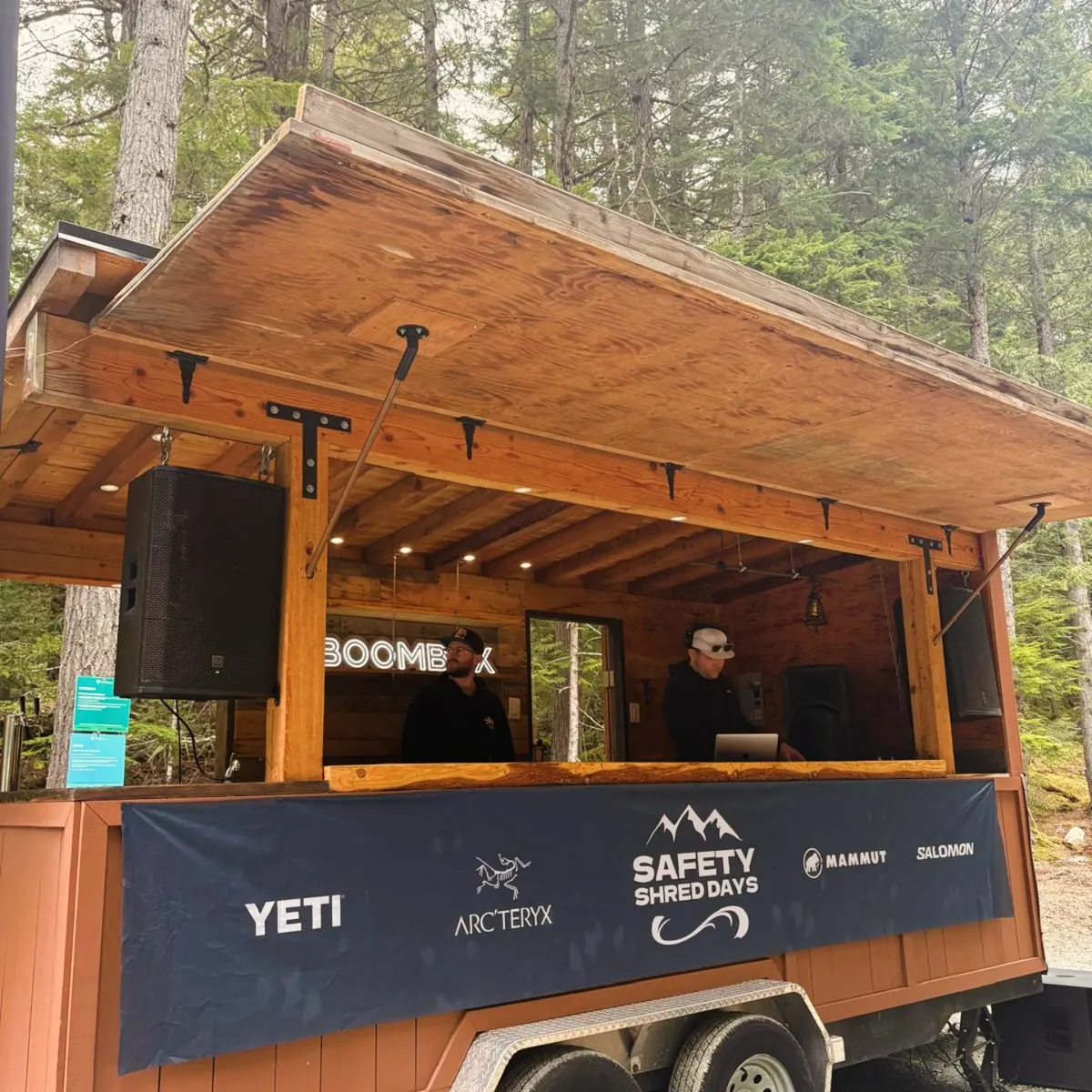 Safety Shred Days banner with YETI, Arc'teryx, Mammut and Salomon logos across the Boombox bar front
