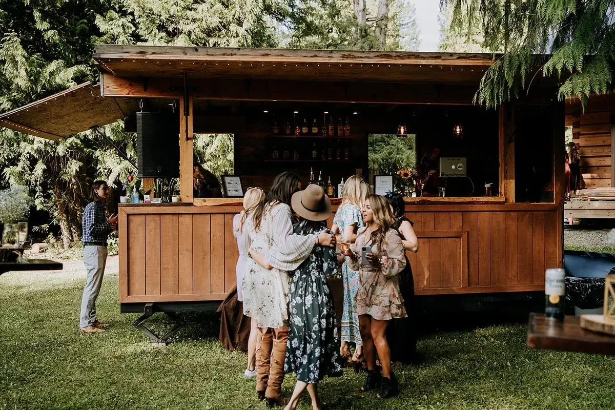 Wedding guests gathered at the Whistler Boombox bar on a summer afternoon